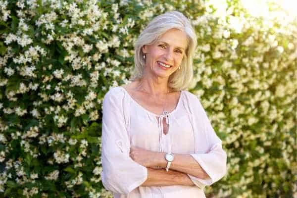 Older woman happy with urinary incontinence treatment Sunbury-on-Thames