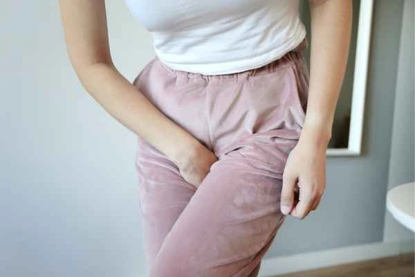 woman running for the toilet because of urinary incontinence Sunbury-on-Thames